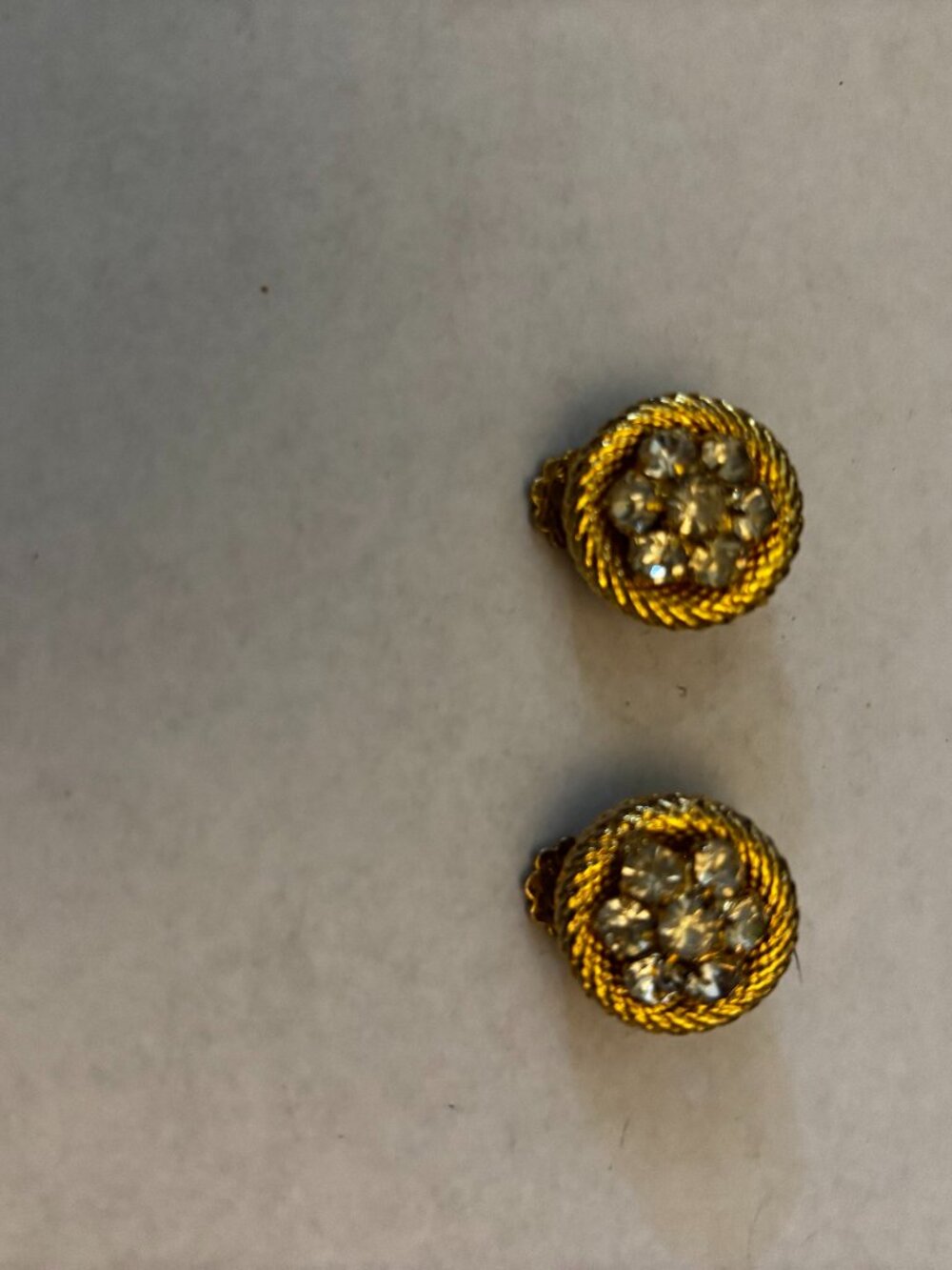 Clip on earrings gold tone braid circle rhinestones